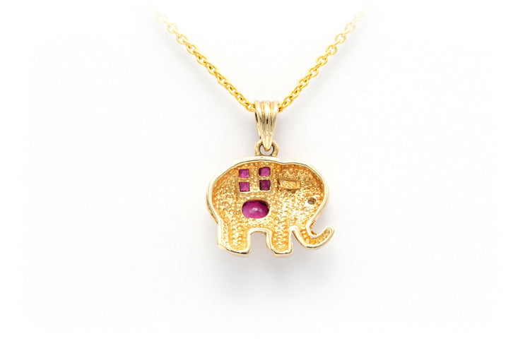 Pendentif Pendentif en or jaune serti de rubis et d'un diamant 58 Facettes B554