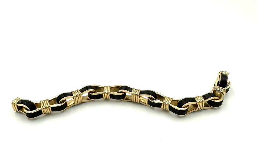 Bracelet HERMES/LENFANT. Bracelet vintage or jaune 18K et crin de cheval 58 Facettes