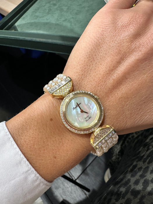 Montre Baskania - Montre femme or jaune - perles de culture et diamants 58 Facettes 1.0000135/4