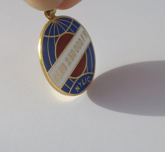 Pendentif Pendentif ancien globe terrestre New York Life insurance Company émail 58 Facettes