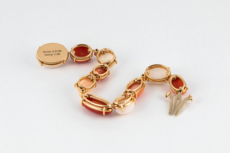 Bracelet Bracelet corail rouge et rose pale 58 Facettes 175328