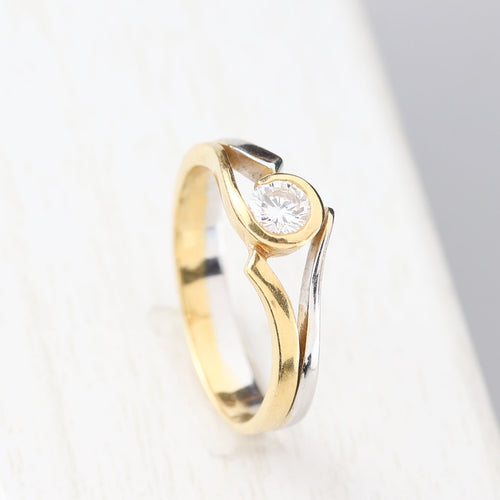 Bague 55 Solitaire bicolore avec diamant taille brillant 58 Facettes 129595