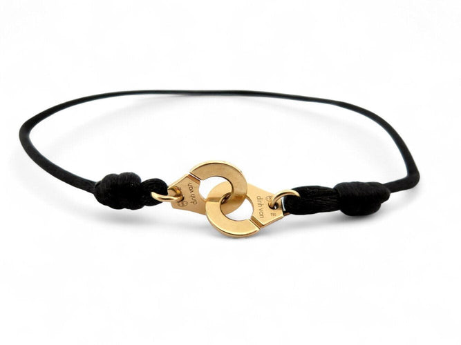 Bracelet bracelet DINH VAN menottes r10 341102 en or jaune 18k 2.9gr & cordon noir 58 Facettes 270151