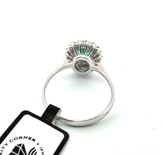 Bague 56 Bague en or blanc avec émeraudes et diamants 58 Facettes