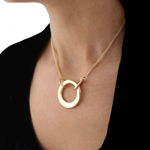 Collier Collier Luxe Grand Cercle or jaune, fermoir cabochon saphir 58 Facettes