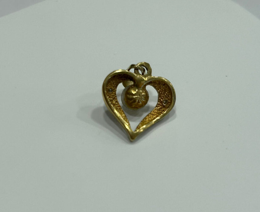 Pendentif Pendentif coeur 2 ors diamants et perle 58 Facettes LP425