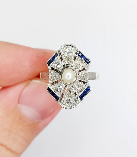 Bague marquise Art Déco Platine perle, diamants et saphirs calibrés (circa 1920) 58 Facettes A06226