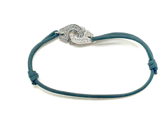 Bracelet DINH VAN - Bracelet Menottes R12 avec diamants, sur cordon 58 Facettes M9044