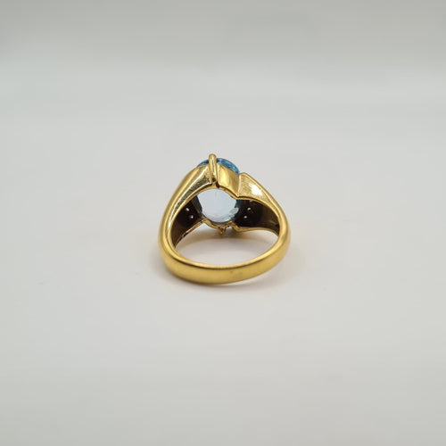 Prsten ze žlutého zlata 18 karátů osazený modrým topazem a diamanty 