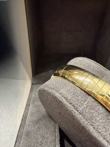 Bracelet CHAUMET - Bracelet « plume » or jaune et diamants 58 Facettes 1.0000453/1