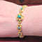 Bracelet Bracelet en or jaune et turquoises 58 Facettes 27765