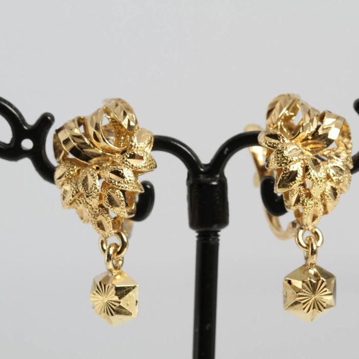 gold plant motif earrings