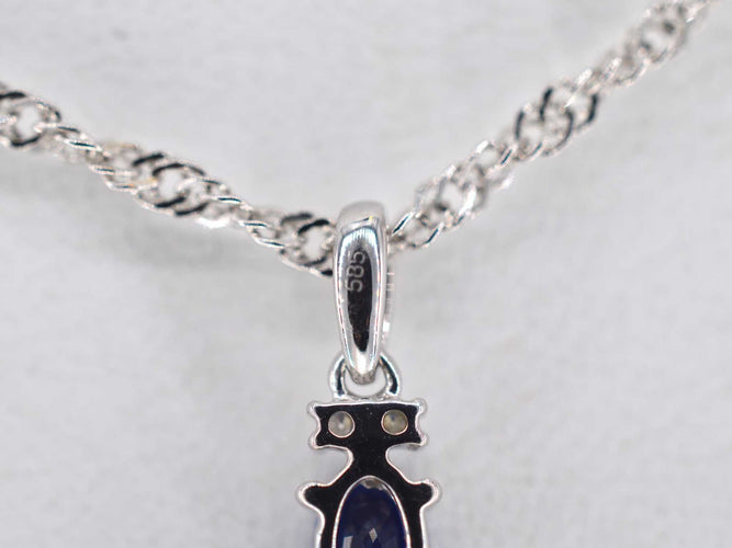 Pendentif Pendentif en or blanc avec diamants et saphir 58 Facettes 2136