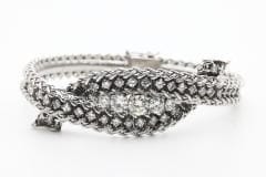 Bracelet BRACELET RIGIDE TORSADE DIAMANTS EN OR GRIS 18K 58 Facettes