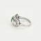 Bague 53 Bague en or blanc, diamants et émeraude 58 Facettes B240734