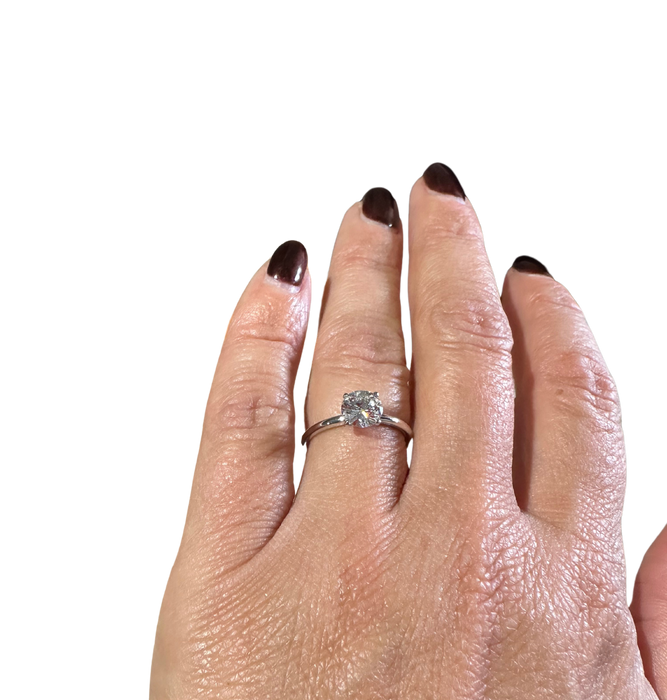 White gold ring with a diamond