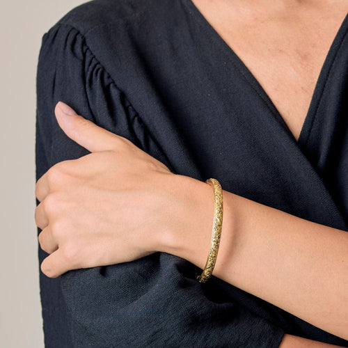 Bracelet Bracelet jonc en or jaune à motif végétal 58 Facettes SOR1095