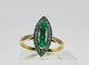 Bague Bague marquise ornée d'émeraudes et de diamants 58 Facettes 50264