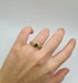 Bague 56 Bague or jaune sertie de diamants et d’un saphir 58 Facettes