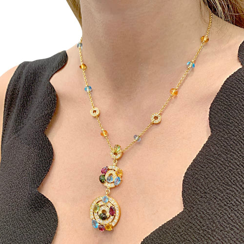 Collier Collier BULGARI "Astrale", or jaune, diamants et pierres de couleur. 58 Facettes 34838