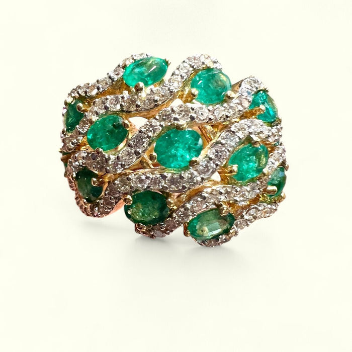 yellow gold ring with emeralds and diamonds