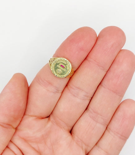 Bague 52 AUGIS - Bague médaille amour or jaune couronne de lauriers ornée de rubis et de diamant (circa 1958) 58 Facettes A04959