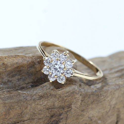 Bague Bague en or jaune 18 carats sertie d'une rosette de diamants 58 Facettes J000002425