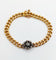 Bracelet Bracelet or jaune et argent, marguerite ornée de diamants 58 Facettes A05479