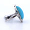 Bague Bague en or blanc avec turquoise et onyx 58 Facettes