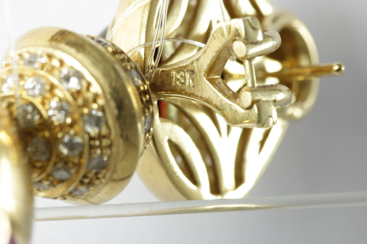 Boucles d'oreilles Boucles d'oreilles vintage en or jaune avec améthyste, onyx, rubis et diamants 58 Facettes 3294