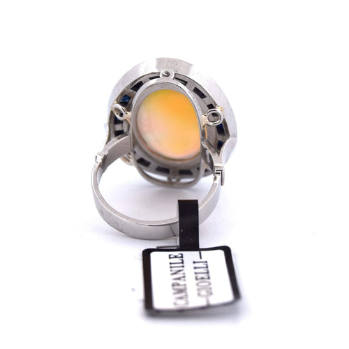 Bague 54 Bague en platine ornée d'opale, d'onyx et de saphirs 58 Facettes