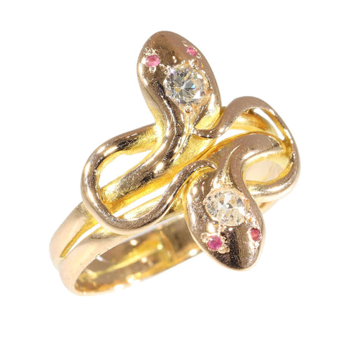 Bague 58 Élégance symbolique : bague antique double serpent avec diamants et rubis 58 Facettes 24278-0102