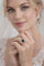 Bague 59 Bague en or jaune sertie d'un saphir bleu foncé et d'un halo de diamants. 58 Facettes 50355