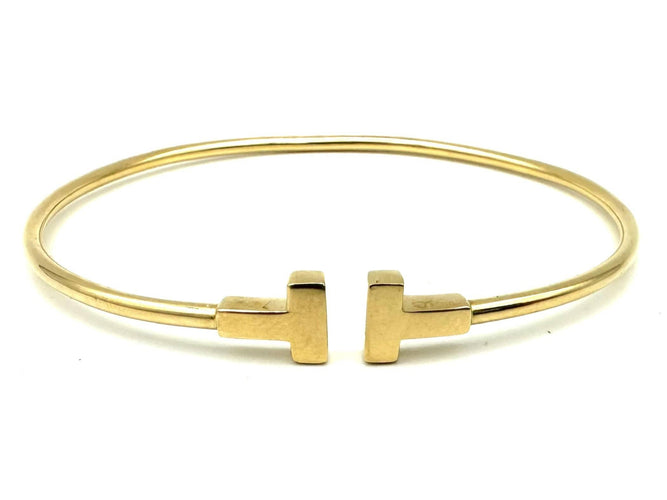 Bracelet TIFFANY & Co. Collection "T", bracelet or jaune 18K 58 Facettes
