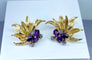 Boucles d'oreilles 50 Bague et boucles d’oreilles en or 18 carats, améthystes et diamants 58 Facettes AB506