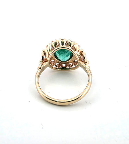 Anello in oro giallo e argento con smeraldo e diamanti 