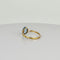 Bague Bague en or jaune avec topaze bleue ovale 58 Facettes 2508021