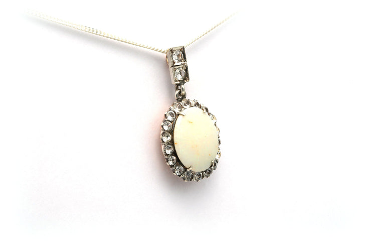 Pendentif Pendentif art déco en or jaune et argent serti d'une opale 58 Facettes B528