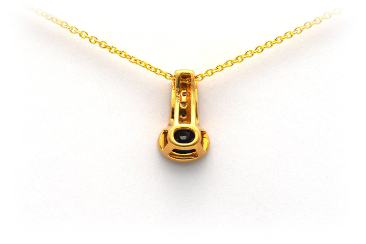 Pendentif Pendentif contemporain en or jaune, serti de diamants et d'un saphir 58 Facettes 10078