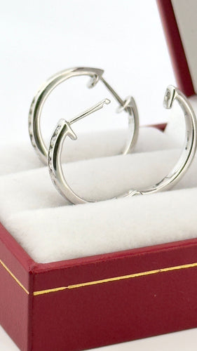 Créole en diamants , or blanc 18 carats 58 Facettes