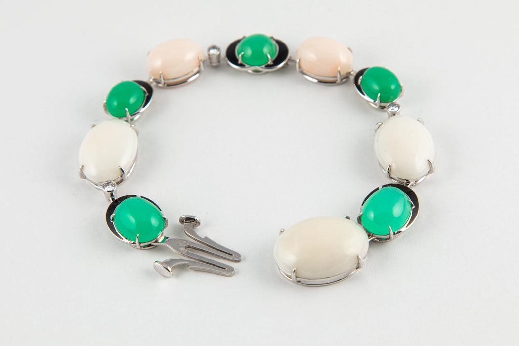 Bracelet Bracelet or gris serti de corail blanc et de chrysoprases 58 Facettes 175307