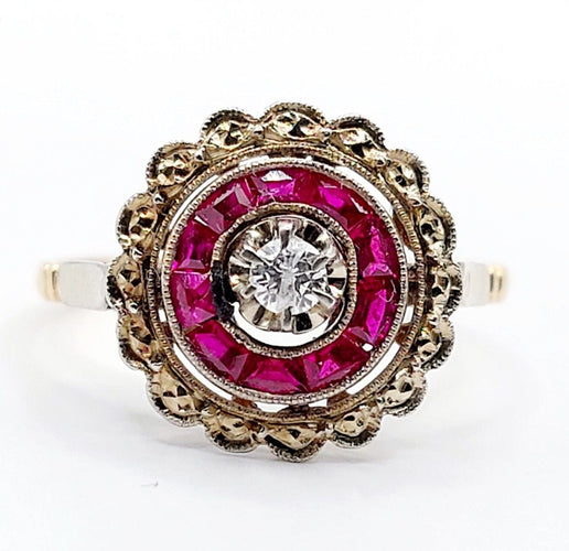 Bague 48 Bague cible Art Déco or rose, diamant, rubis calibrés (circa 1920) 58 Facettes A04432