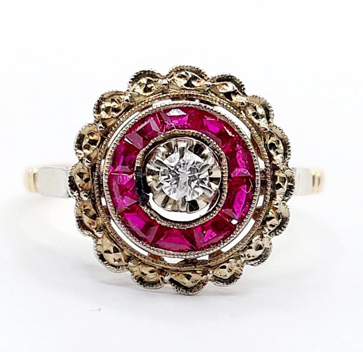 Bague 48 Bague cible Art Déco or rose, diamant, rubis calibrés (circa 1920) 58 Facettes A04432