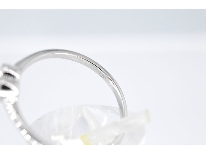 Bague Bague en or blanc avec un diamant taille brillant en forme de cœur 58 Facettes 2094