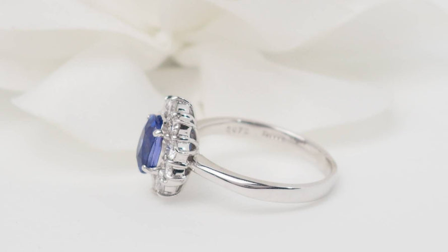 Bague 57 Bague marguerite en platine, tanzanite et diamants 58 Facettes 32520