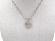 Collier Collier en or blanc 750 mil et pendentif cœur en diamants 58 Facettes