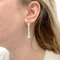 Boucles d'oreilles Paire de boucles d'oreilles pendantes, or blanc et diamants. 58 Facettes 34756