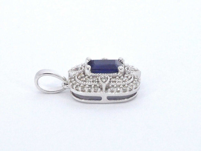 Pendentif Pendentif en or blanc avec diamants et saphir 58 Facettes 2350