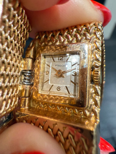 Montre Bracelet Montre Ruban Tressé - Or jaune et Diamants 58 Facettes 1.0000912/1