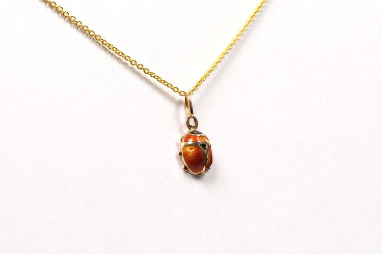 Pendentif Pendentif années 70 or jaune serti d'émail 58 Facettes 21640